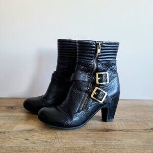 Miz Mooz black booties with brass buckles.